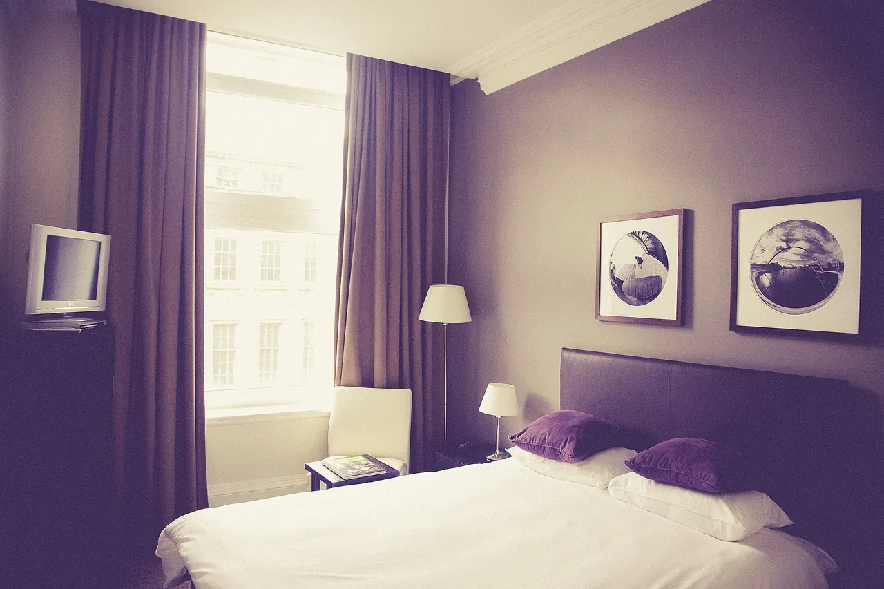 Illustrative photograph of hotel bedroom windows, not a hotel reviewed on this site.