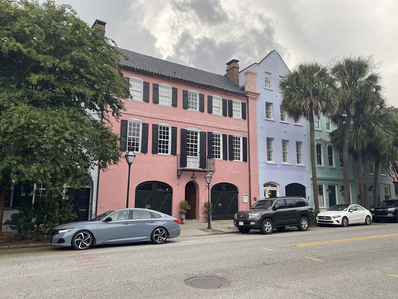 Rainbow Row in Charleston, South Carolina. Photograph of the street, not a hotel.