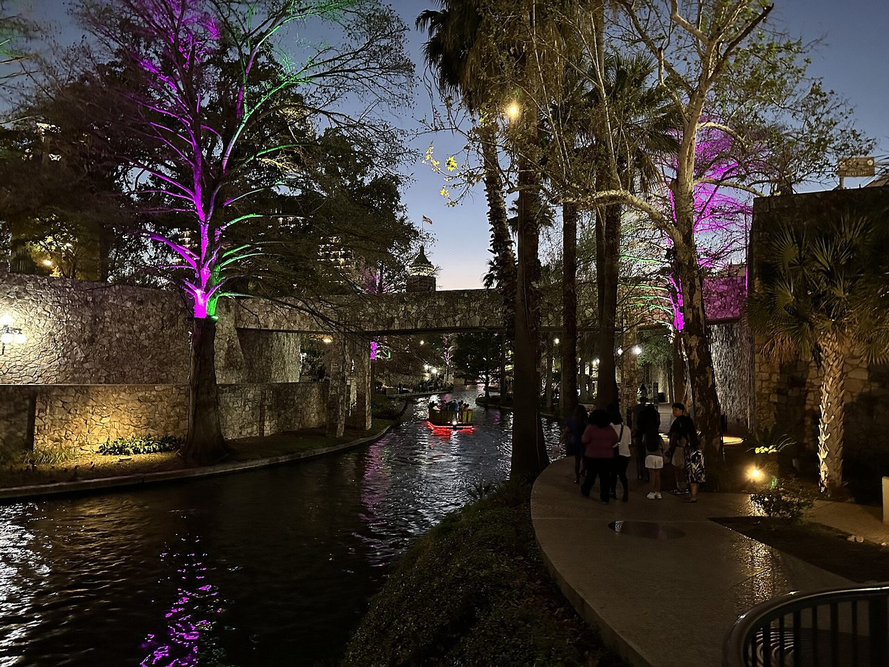 The San Antonio River Walk at night. Photograph of the river walk, not a hotel.
